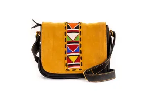 Handcrafted Leather Shoulder Bag with Beaded Tribal Pattern