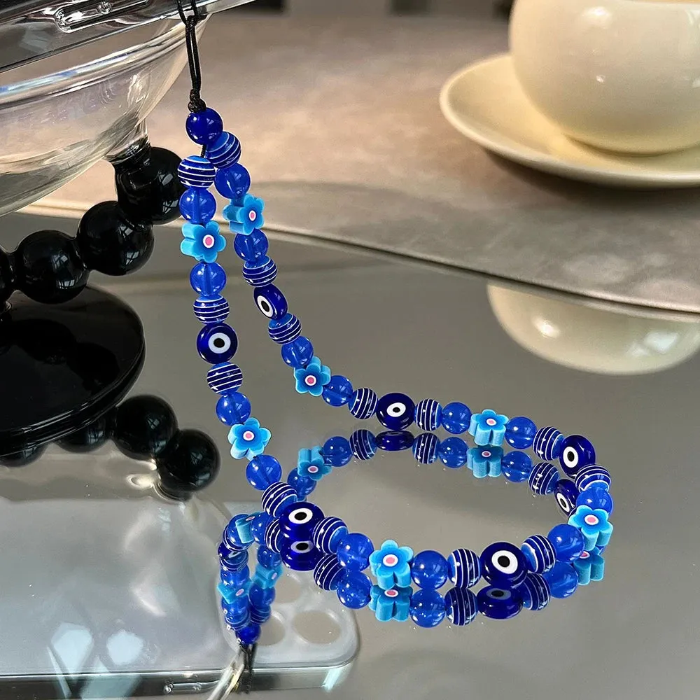 Stylish Blue Evil Eye Beaded Phone Strap with Flower Charm for Women’s Mobile Accessories