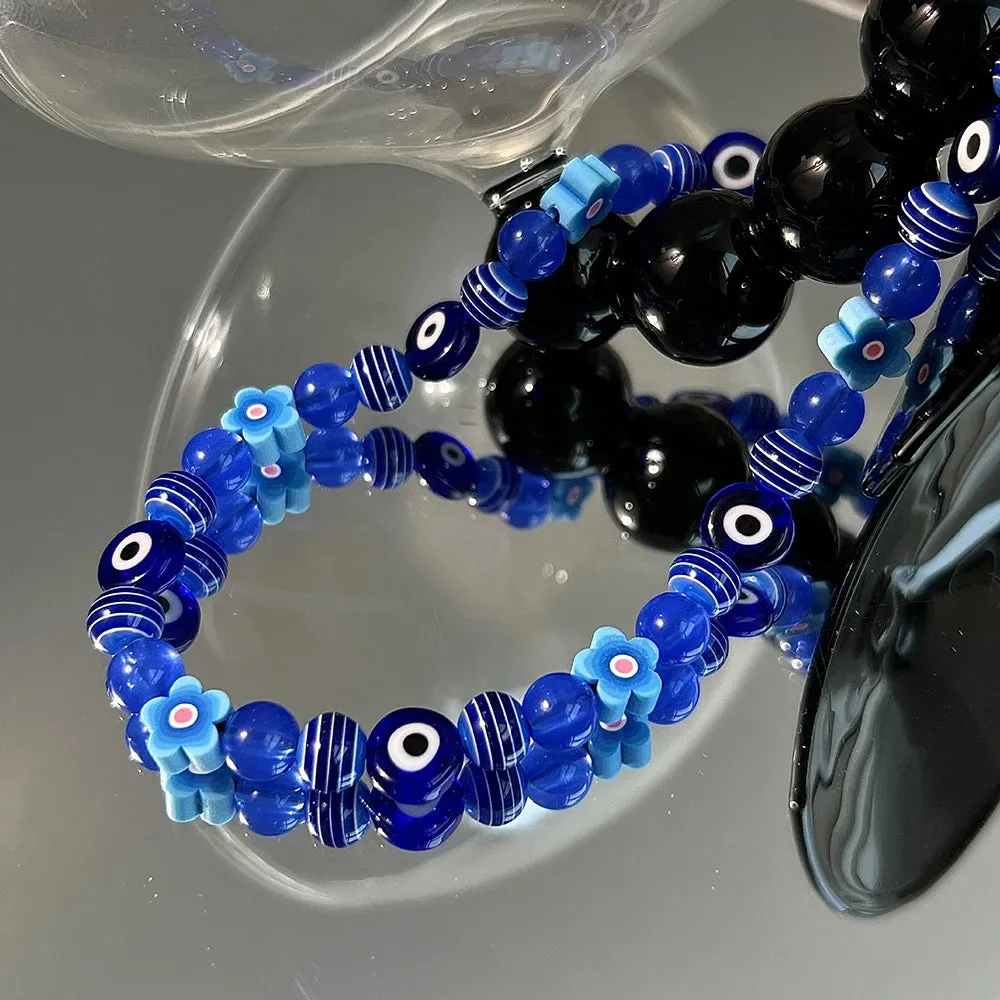 Stylish Blue Evil Eye Beaded Phone Strap with Flower Charm for Women’s Mobile Accessories