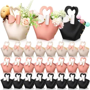 Sweetude 24 Sets Heart Shaped Gift Boxes with Coquette Bow 6.3x4.9x2 Inch Reusable Leather Bowknot Handbag Treat Box Candy Bag with Handle for Mom Birthday Wedding Baby Shower Favor(Stylish Style)