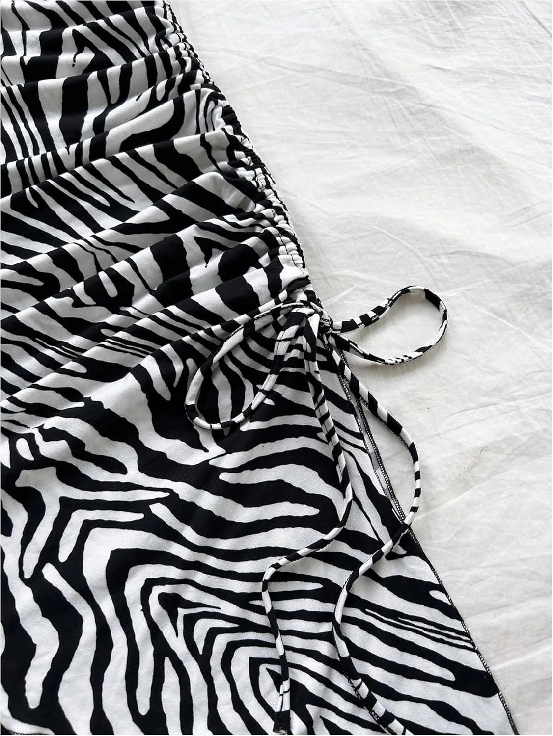 WDIRARA Women's Zebra Striped Sleeveless Halter Mini Dress Drawstring Split Side Asymmetrical Bodycon Dresses